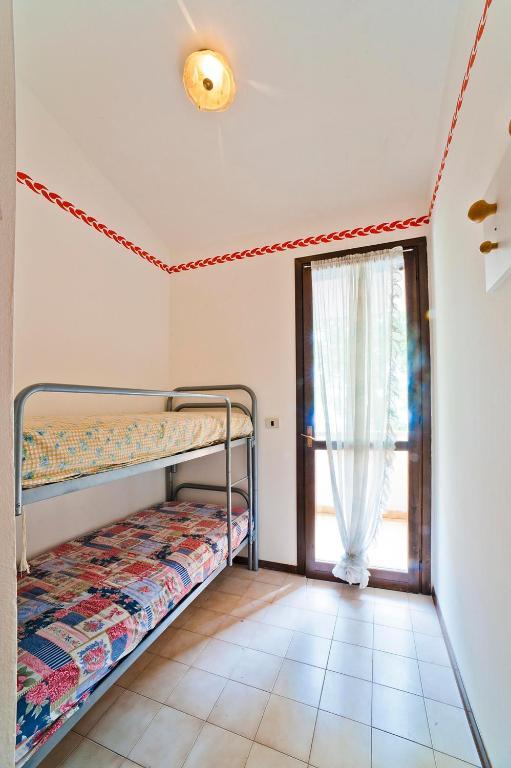 Residence Cinzia Pool Bibione Pokoj fotografie